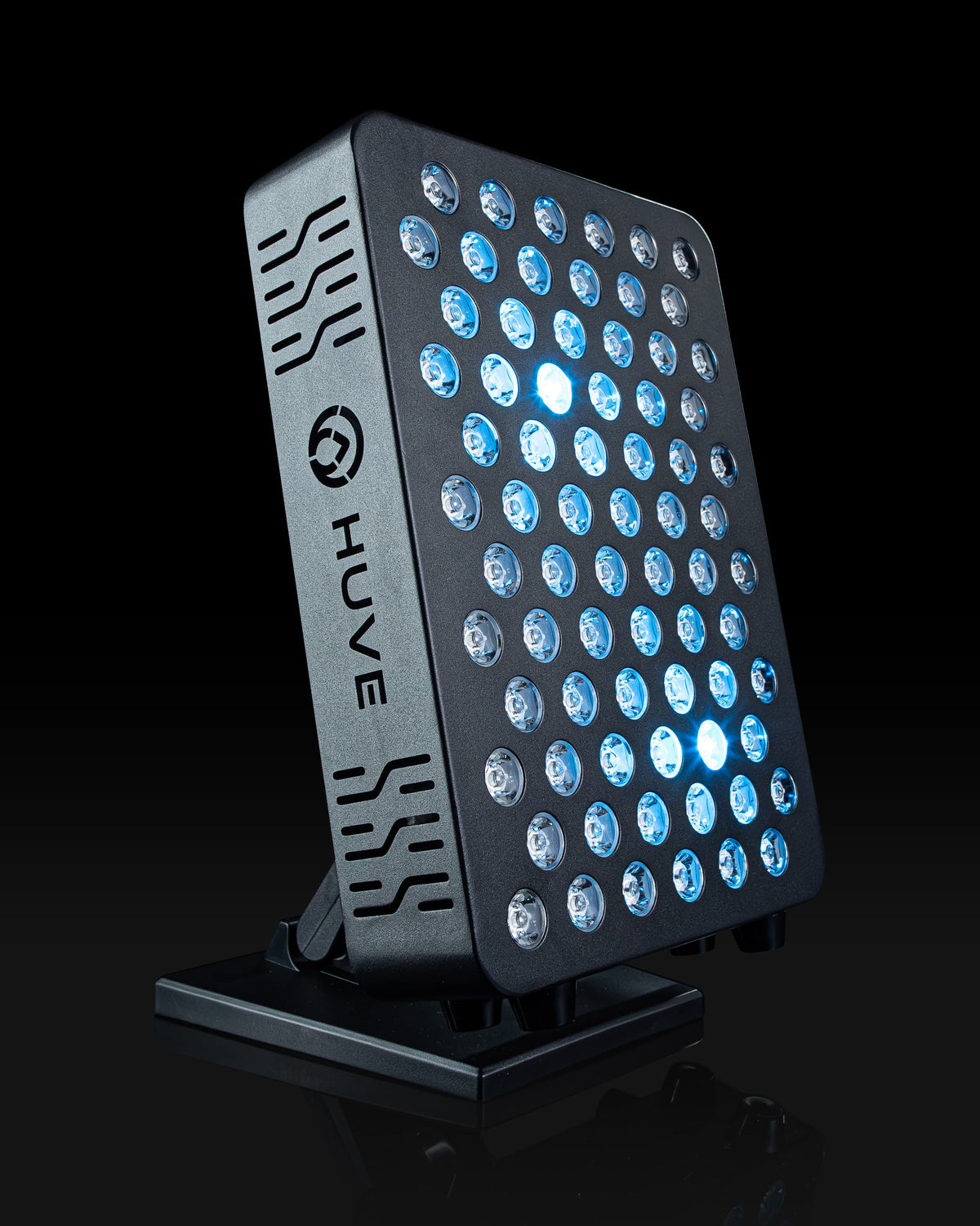 HUVE Luma red light therapy panel in black, side view, blue light