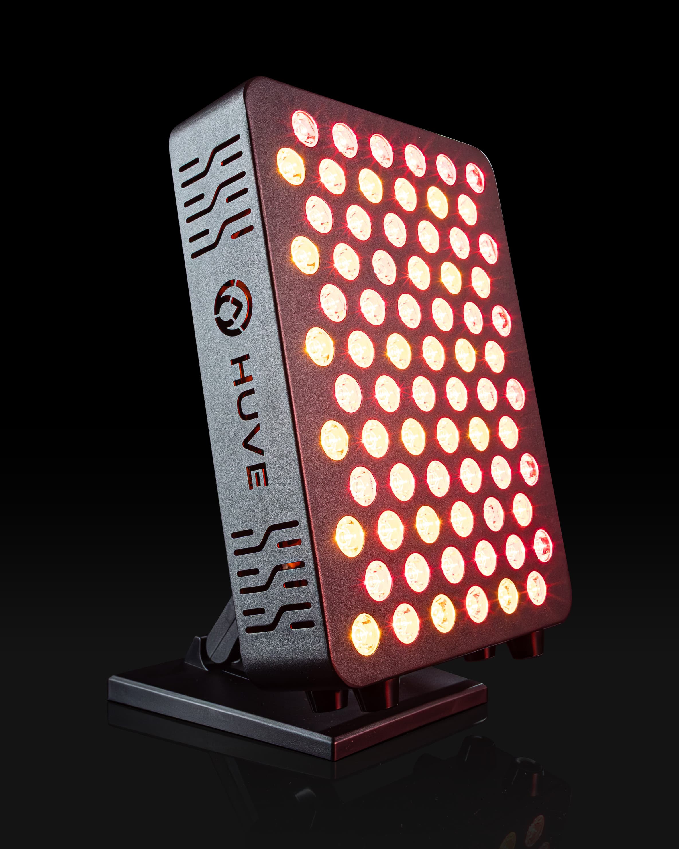 HUVE Luma red light therapy panel in black, side view, red light