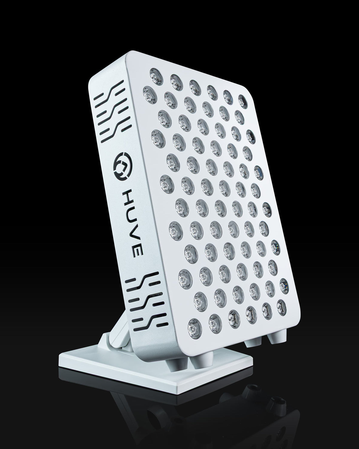 HUVE Luma red light therapy panel in white, side view, no lights on