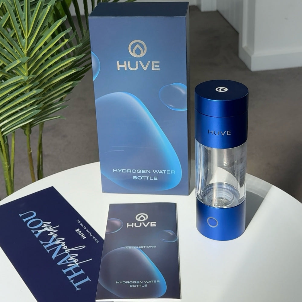 HUVE Perform hydrogen water bottle in cobalt blue shown with premium retail packaging