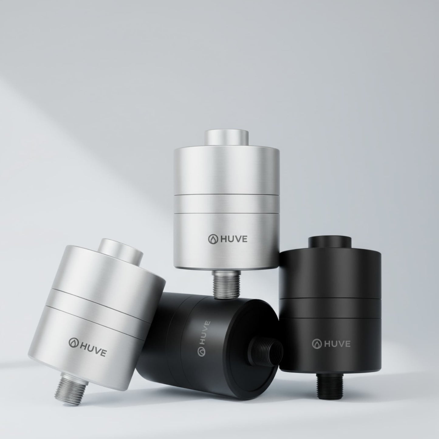 HUVE Flow premium shower filter shown in silver and black colour options