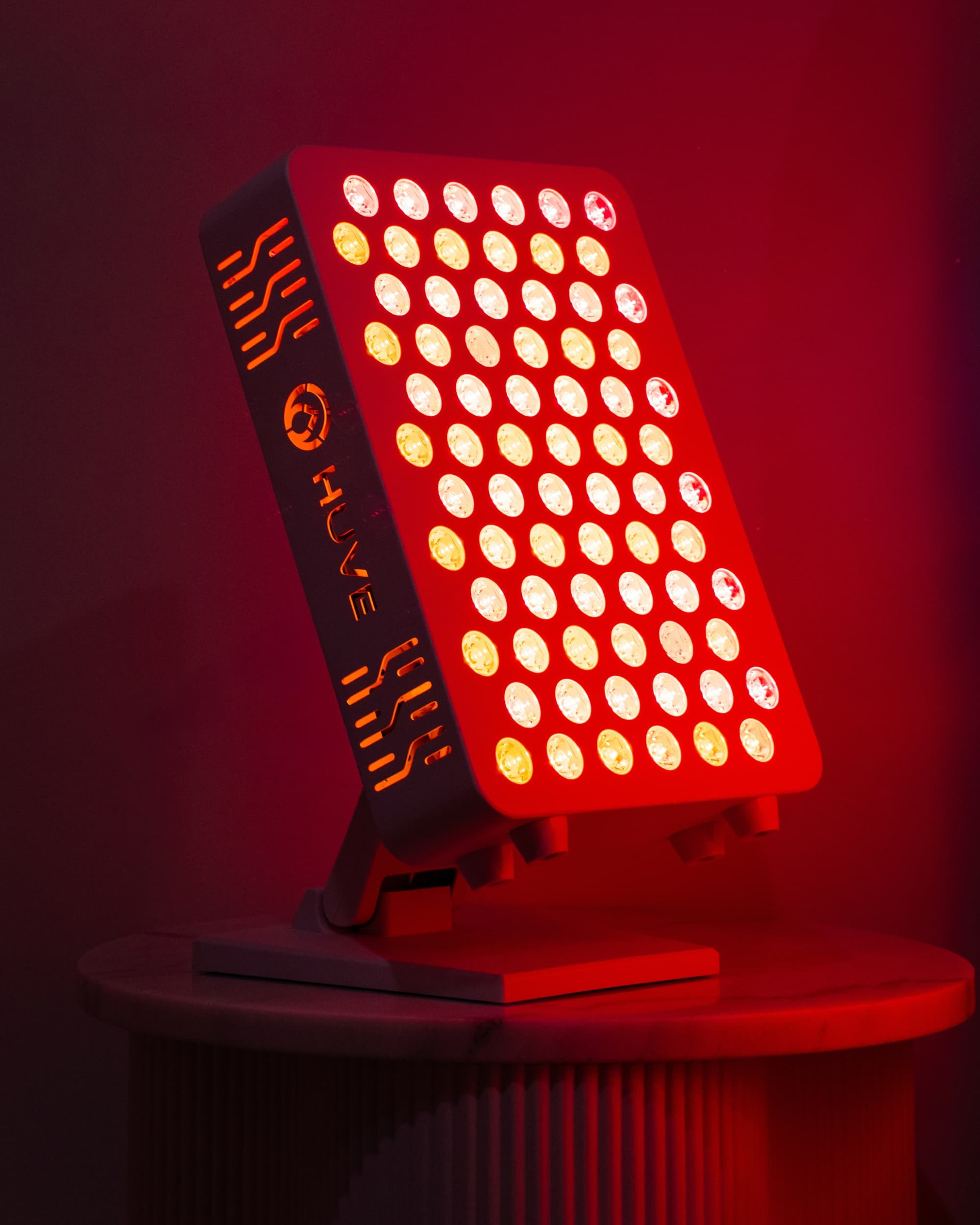 HUVE Luma Glow on bedside table