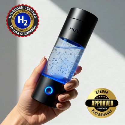 Person holding a black HUVE Perform hydrogen water bottle generating hydrogen-rich water