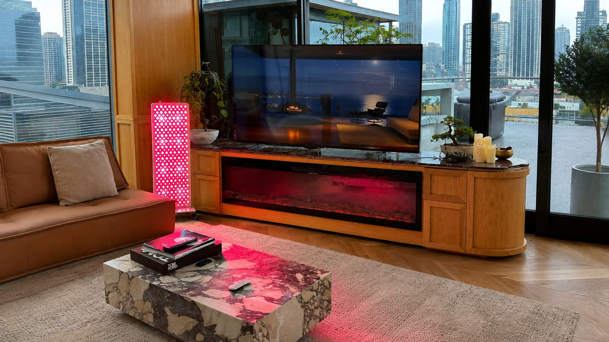 HUVE Luma red light therapy panel in a modern living room